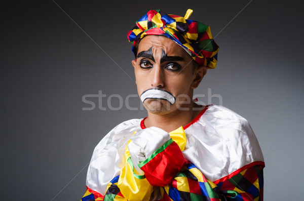 Sad clown against dark background Stock photo © Elnur