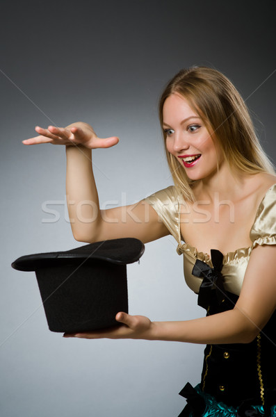 Nő bűvész varázspálca kalap kéz öltöny Stock fotó © Elnur