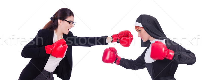Businessman and nun boxing isolated on white Stock photo © Elnur