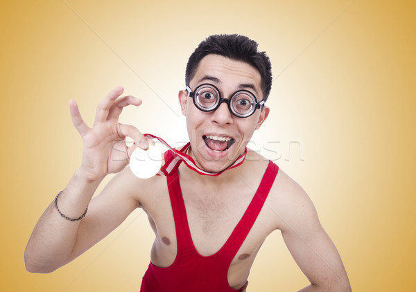 Funny wrestler with winners medal Stock photo © Elnur