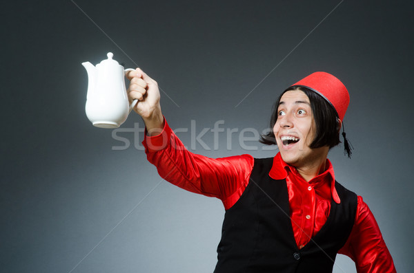 Man wearing red fez hat Stock photo © Elnur