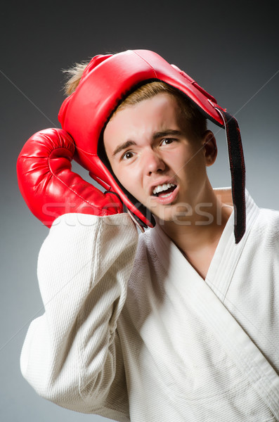 Amuzant boxer întuneric mână fundal cutie Imagine de stoc © Elnur