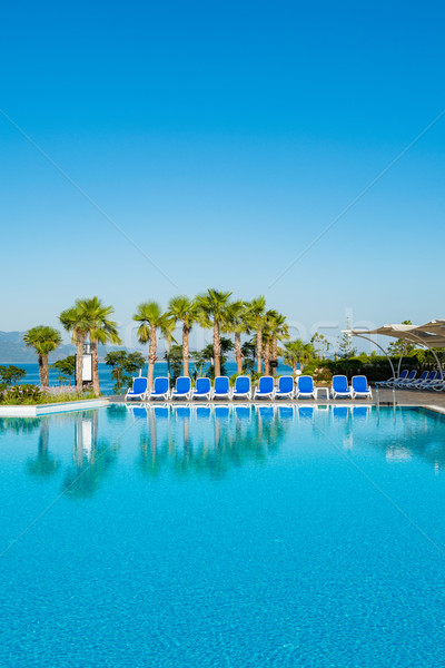 Nice swimming pool outdoors on bright summer day Stock photo © Elnur