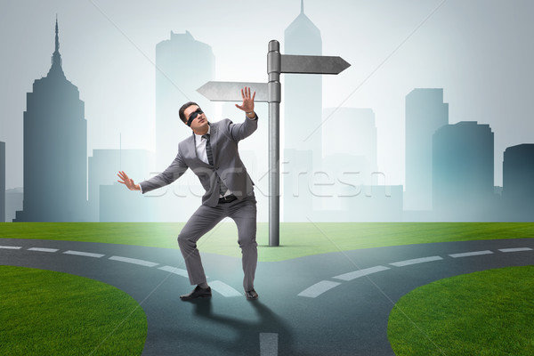 Businessman in difficult choice concept Stock photo © Elnur