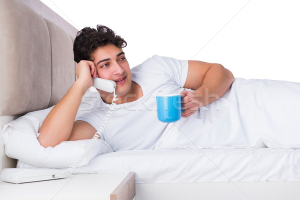 Man bed lijden slapeloosheid telefoon gelukkig Stockfoto © Elnur