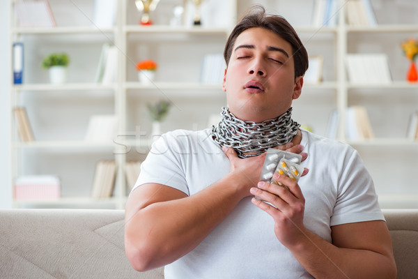 Young man suffering from sore throat Stock photo © Elnur