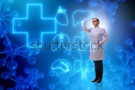 Doctor cardiologist supporting cardiogram heart line Stock photo © Elnur