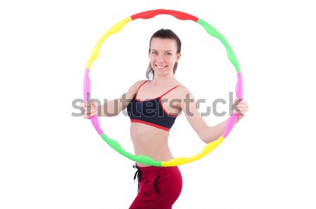 Woman doing exercises with hula hoop Stock photo © Elnur