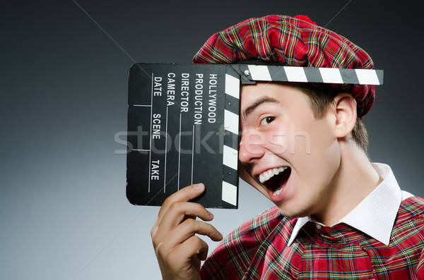 Funny scotsman with movie clapboard Stock photo © Elnur