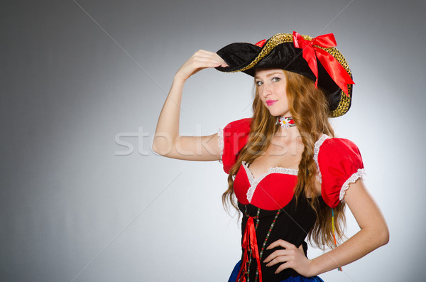 Woman pirate wearing hat and costume Stock photo © Elnur