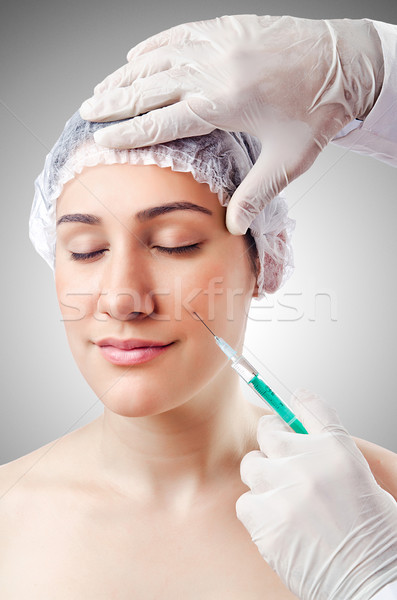 Woman under the plastic surgery Stock photo © Elnur