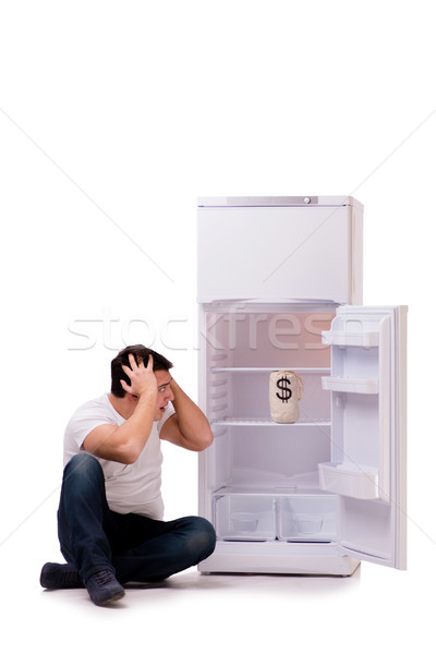 éhes férfi néz pénz hűtőszekrény üzlet Stock fotó © Elnur