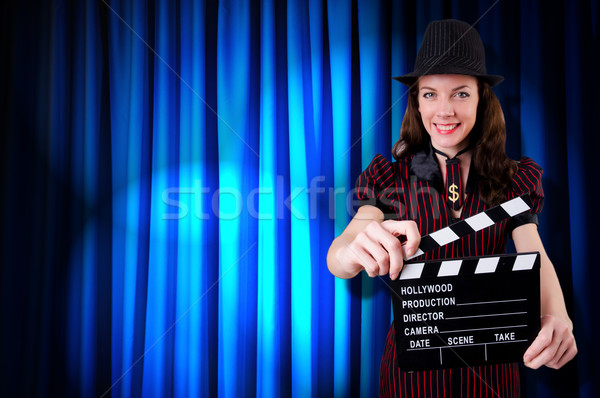Woman gangster with movie clapper Stock photo © Elnur
