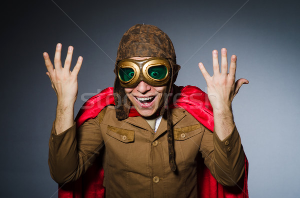 Funny pilot with goggles and helmet Stock photo © Elnur