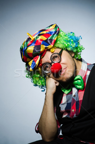 Funny clown against the dark background Stock photo © Elnur