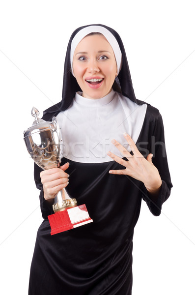 Pretty nun holding winner cup isolated on white Stock photo © Elnur