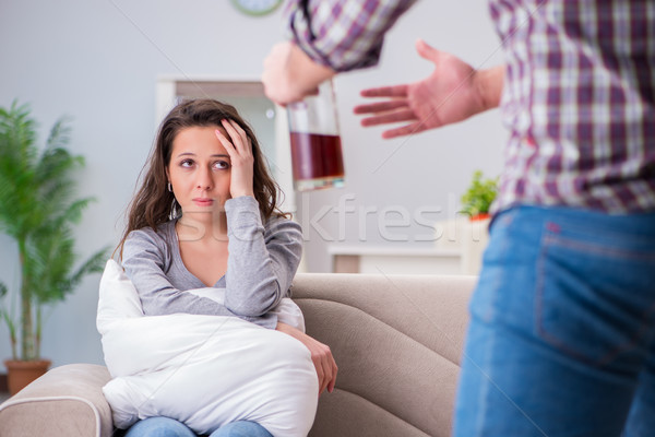 Domestic violence concept in a family argument with drunk alcoho Stock photo © Elnur