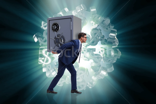 BUsinessman stealing metal safe from bank Stock photo © Elnur