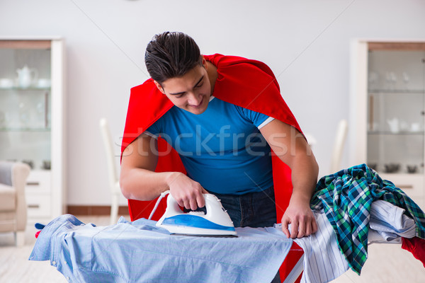Super hero man husband ironing at home Stock photo © Elnur