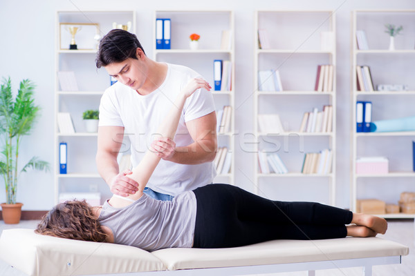 Stok fotoğraf: Genç · doktor · chiropractor · kadın · hasta