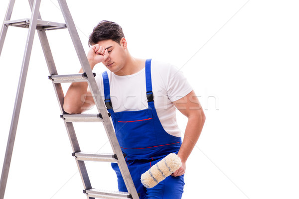 Stock photo: Young painter man with ladder isolated on white background