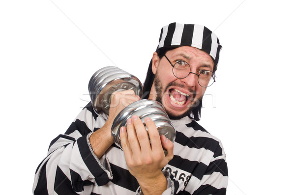 Prison inmate with dumbbells isolated on white Stock photo © Elnur
