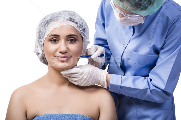 Young woman preparing for plastic surgery isolated on white Stock photo © Elnur