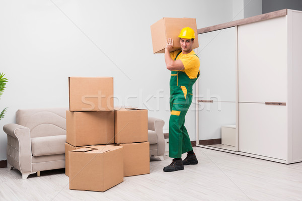 Man delivering boxes during house move Stock photo © Elnur