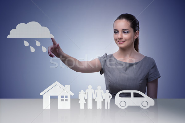 Young businesswoman in insurance concept Stock photo © Elnur