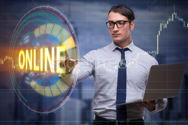 Businessman pressing virtual button online Stock photo © Elnur