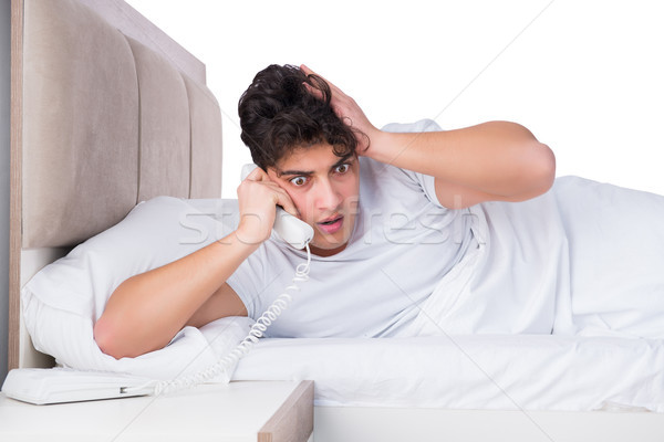 Homme lit souffrance insomnie téléphone téléphone [[stock_photo]] © Elnur
