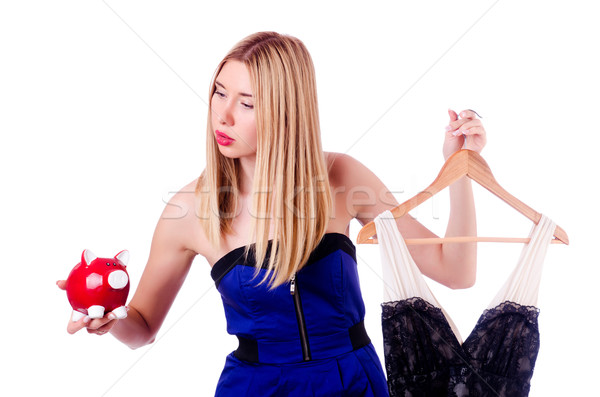 Woman thinking of spending her savings on clothing Stock photo © Elnur
