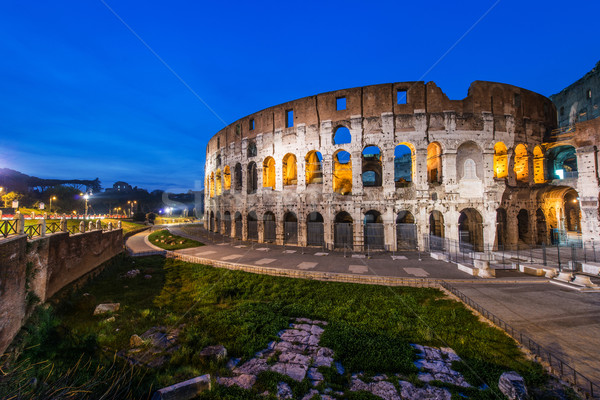 Famous colosseum during evening hours Stock photo © Elnur