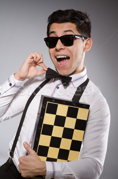 Funny chess player with board Stock photo © Elnur