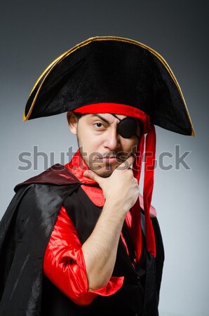 Female pirate in black coat isolated on white Stock photo © Elnur