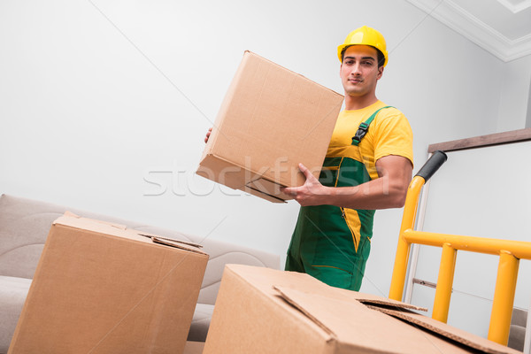 Man delivering boxes during house move Stock photo © Elnur