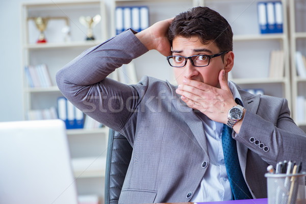 Businessman sweating excessively smelling bad in office at workp Stock photo © Elnur
