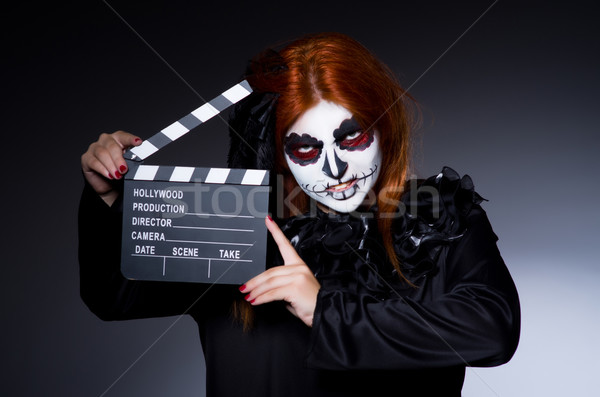 Monster with movie clapper board Stock photo © Elnur