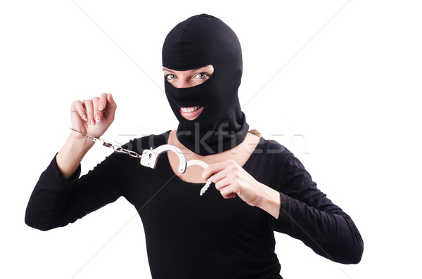 Young female criminal with handcuffs Stock photo © Elnur