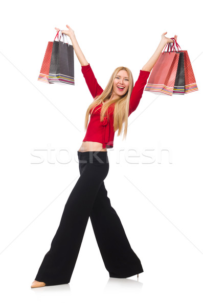 Stock photo: Young woman in flared pants isolated on white