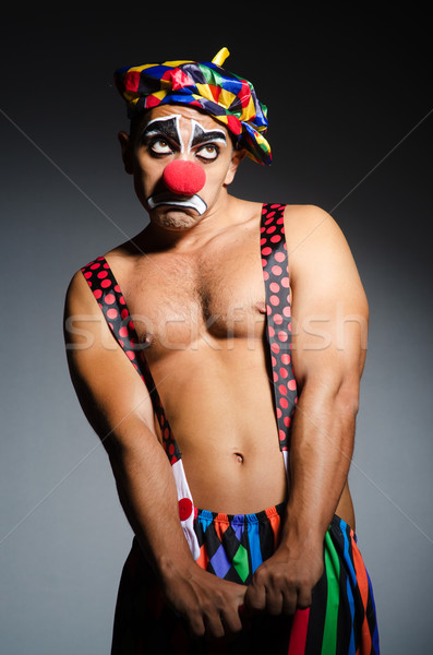 Sad clown against dark background Stock photo © Elnur