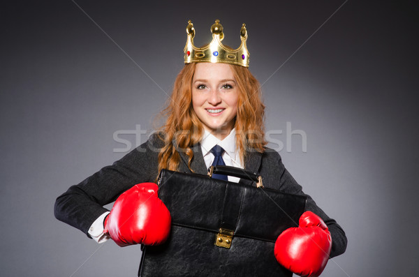 Woman boxer with crown and red gloves Stock photo © Elnur