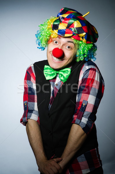 Funny clown against the dark background Stock photo © Elnur