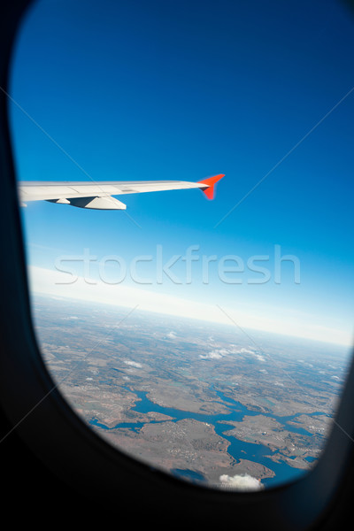 Airplane wing out of window Stock photo © Elnur
