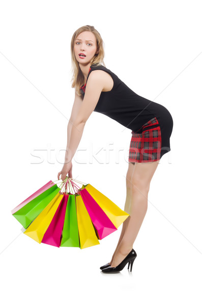 Woman after shopping spree on white Stock photo © Elnur
