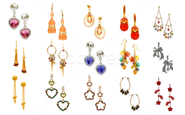 Set of various earrings isolated on white Stock photo © Elnur