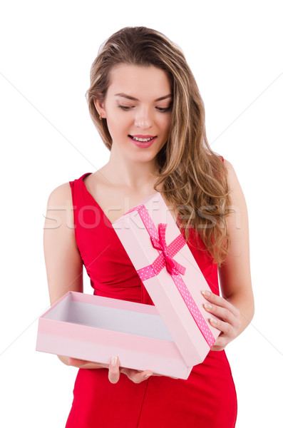 Stock photo: Pretty girl holding gift box isolated on white