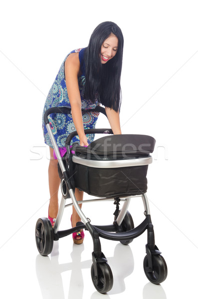 Happy mom with her baby in pram  Stock photo © Elnur