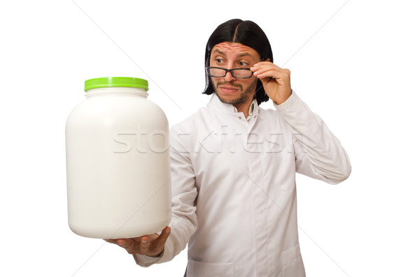 Funny doctor with protein jars isolated on white Stock photo © Elnur