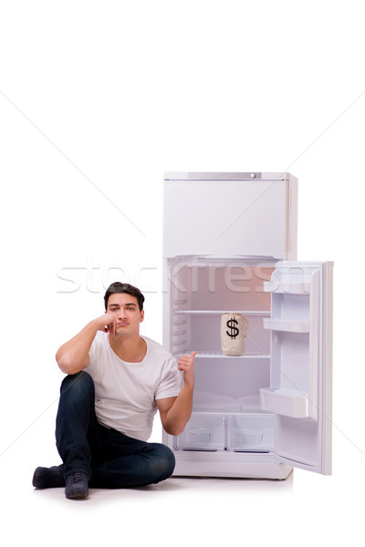 The hungry man looking for money to fill the fridge Stock photo © Elnur